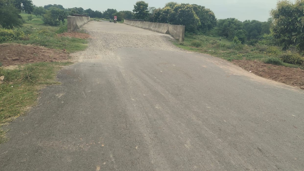 Approach to bridge parallel to 'No Man's Land' collapses; questions raised about quality.