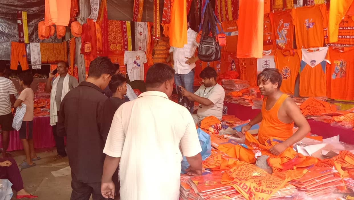 Kanwar Yatra begins; shops decked out with saffron attire.