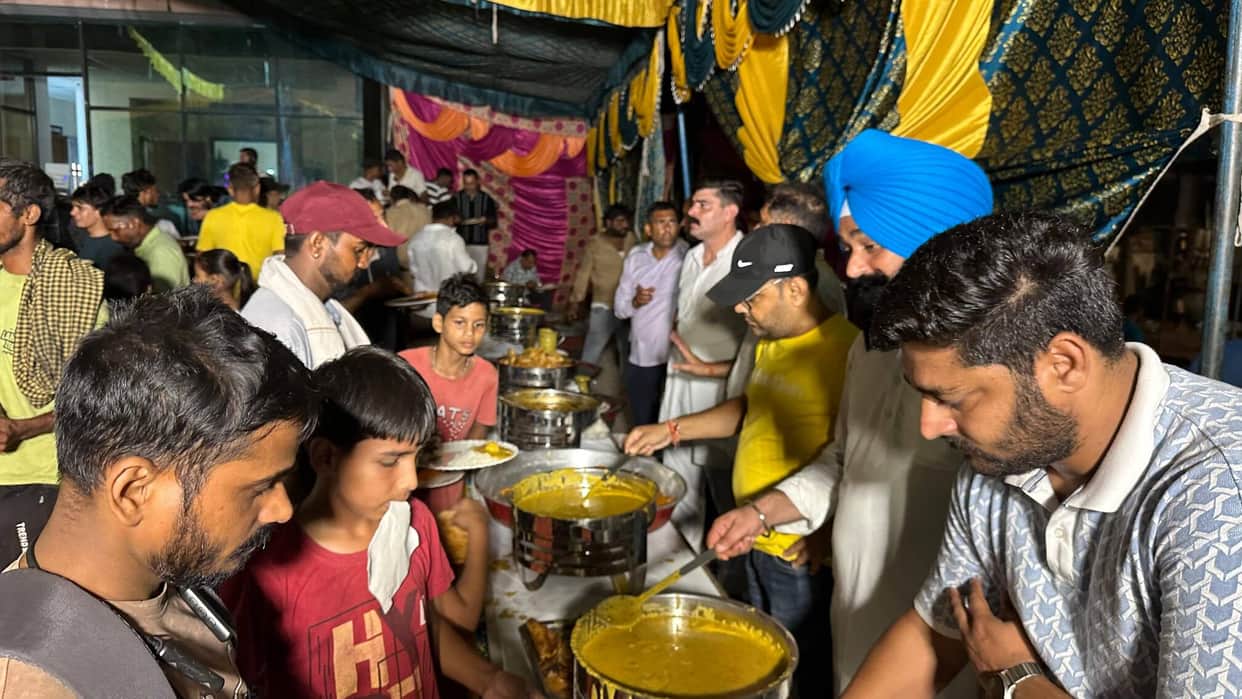Devotees partook of the *prasad* at the community feast