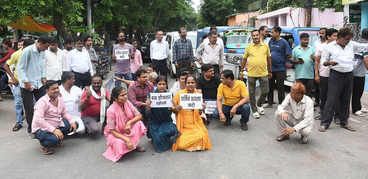 Traders staged a protest by blocking the road over the parking issue.