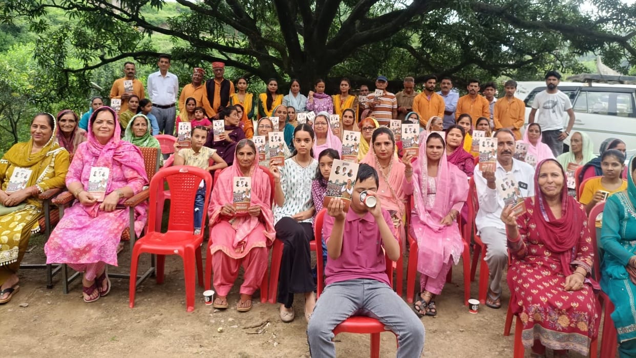 Government schemes were explained to villagers through folk songs and street plays.