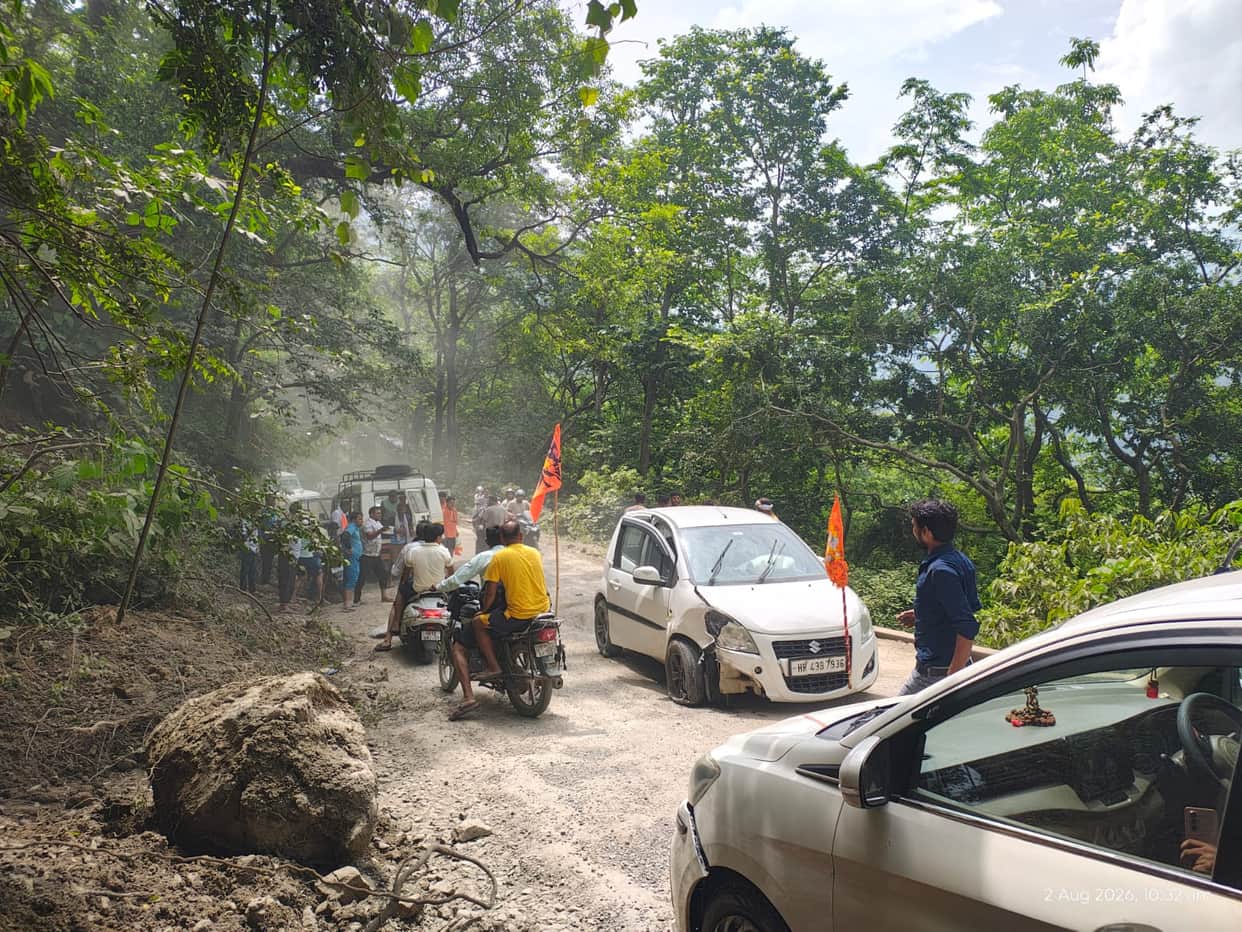 Car tyre bursts; pilgrims panic.