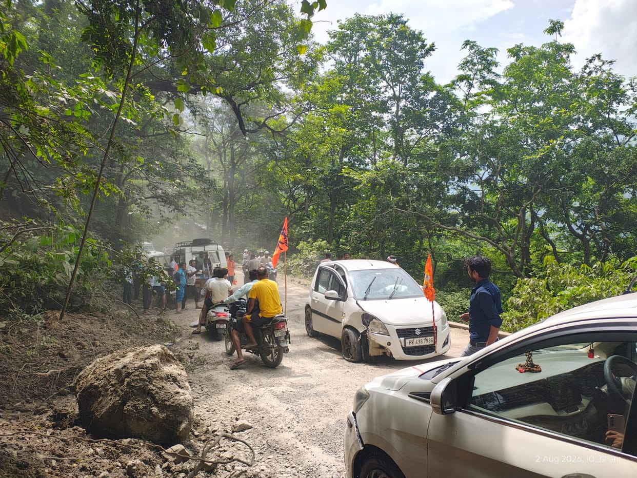 Car tyre bursts; pilgrims panic.