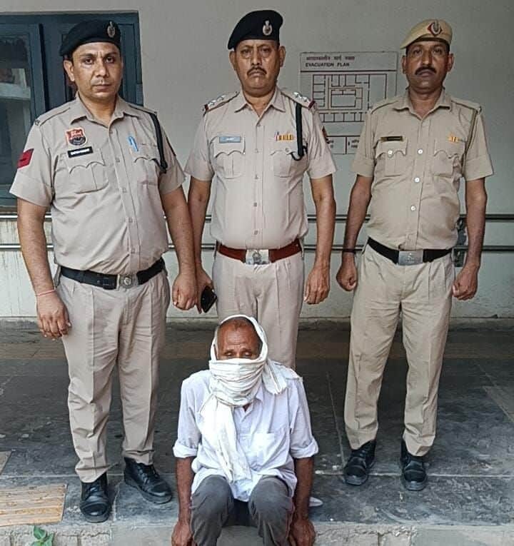 Accused husband arrested before wife's funeral pyre is lit.