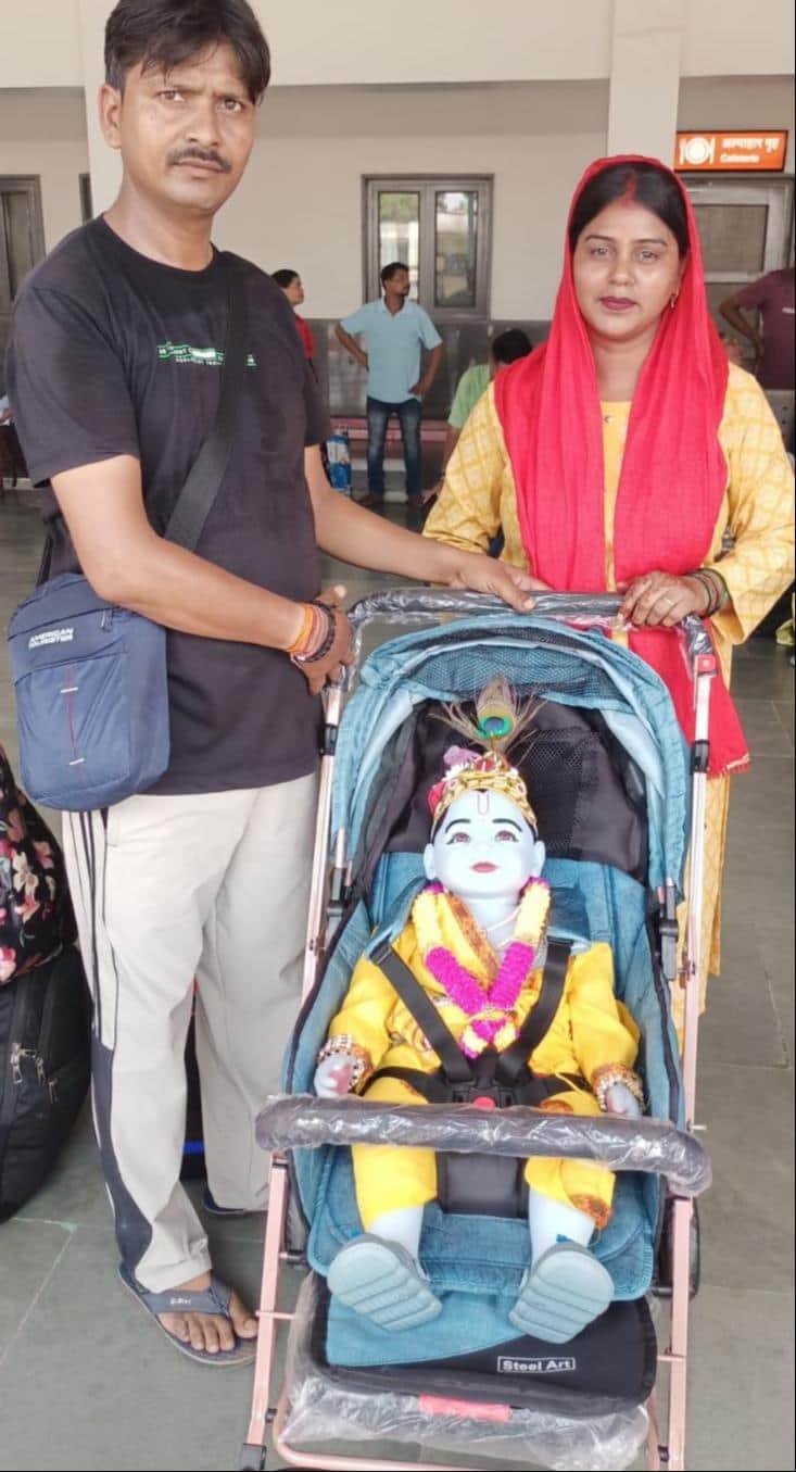 A Kanwar dedicated to Kanha; Laddu Gopal seated in a trolley-walker.