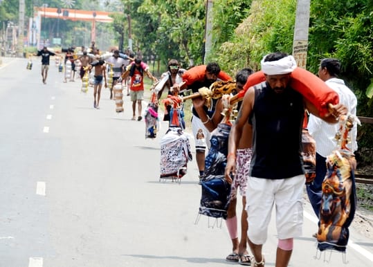 Today is the first Monday of Sawan; a caravan of devotees has begun moving along the Kanwar route.