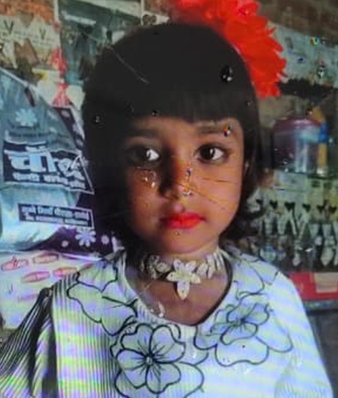 Girl playing outside her home killed after being hit by a pickup truck.