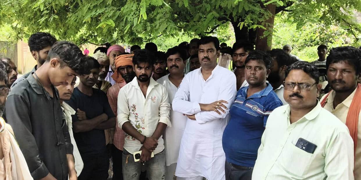 Father and son on a motorcycle died after being struck by a tractor-trolley while trying to avoid potholes on the road.