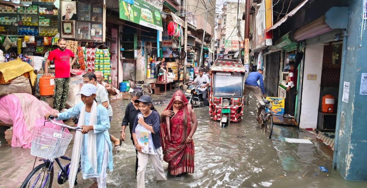Floodwaters reach the Jalalabad-Shamshabad State Highway.