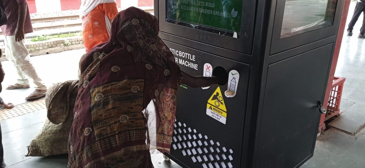 Woman's hand gets stuck in bottle crusher machine; freed after a 15-minute struggle.