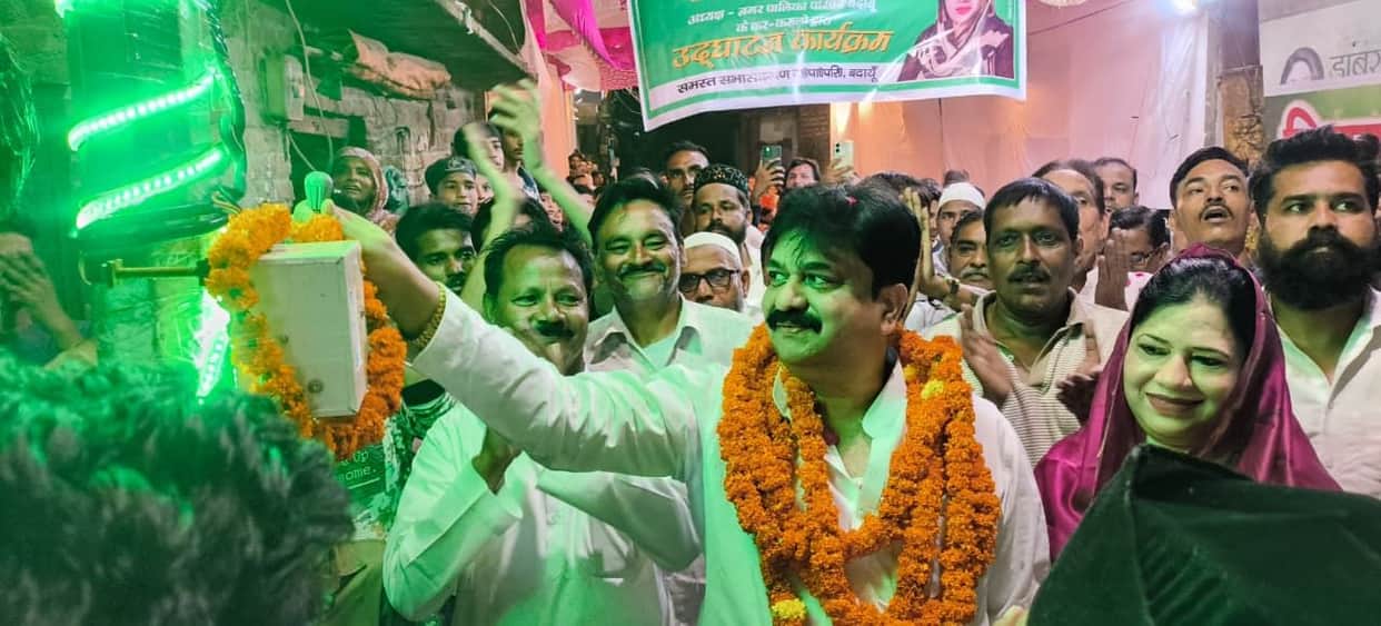 Inauguration of the model road; route illuminated by fancy lights.