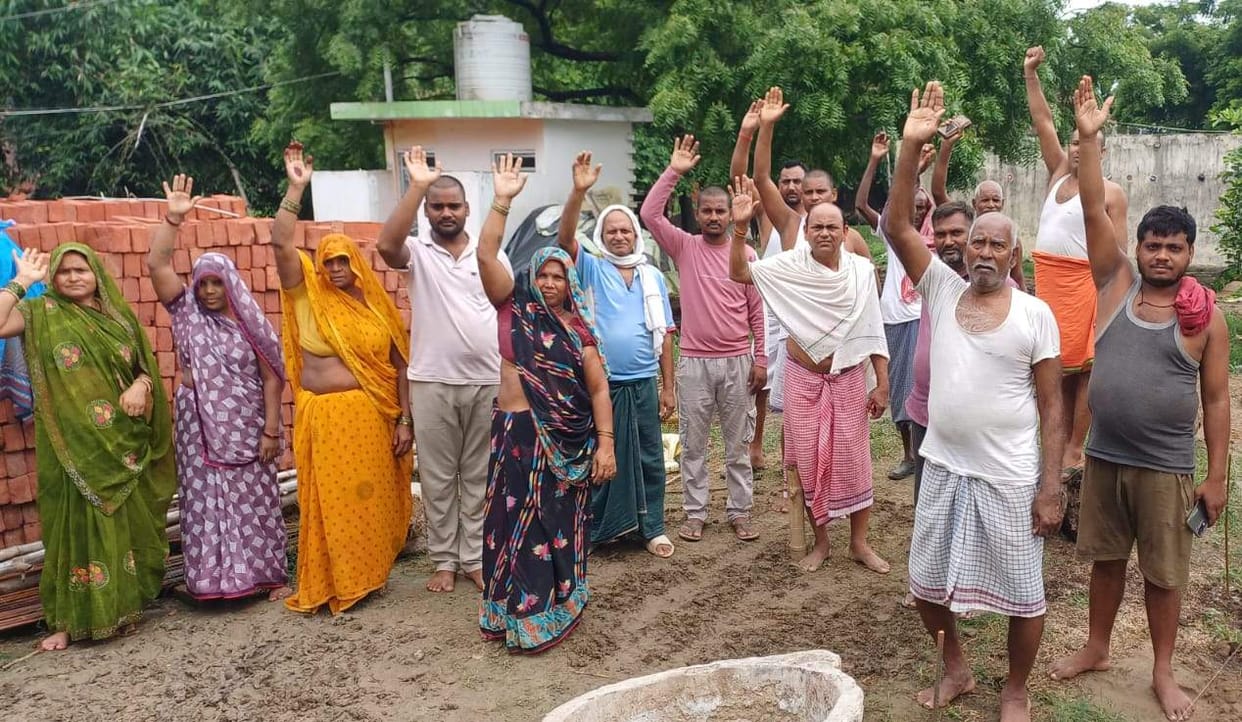 11kV line hanging over houses; villagers protest to have it removed.