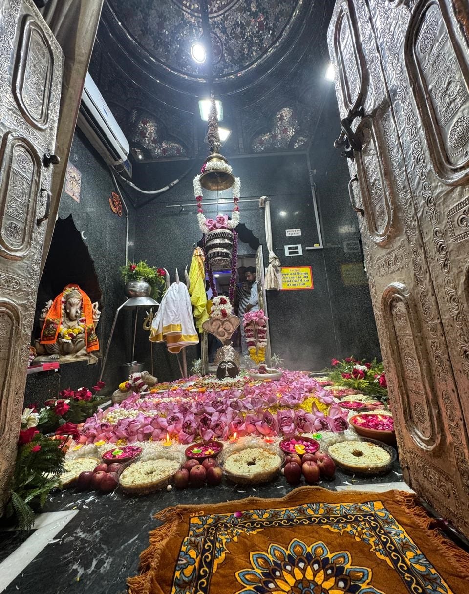 The grand decoration of Bholenath in Shri Kailash Temple, decorated with Ghevar and lotus.