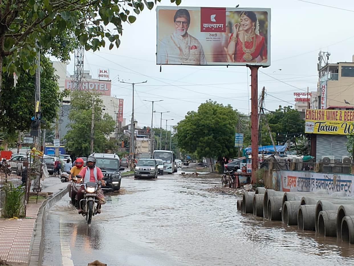 Temperature drops due to rain; waterlogging causes inconvenience to people.