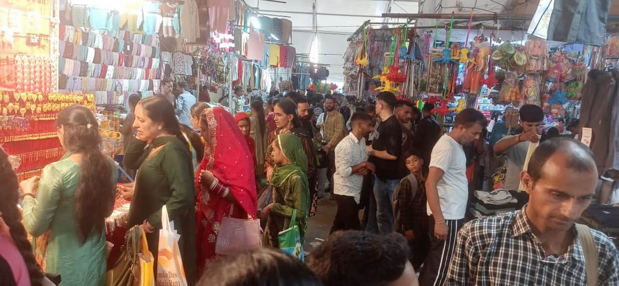 Crowd swells for shopping at the Minjar Fair.