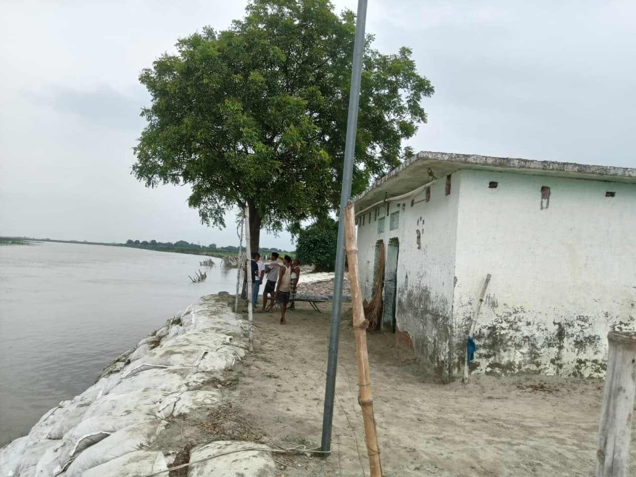 Families living in fear of displacement; boats are the only means of transport.