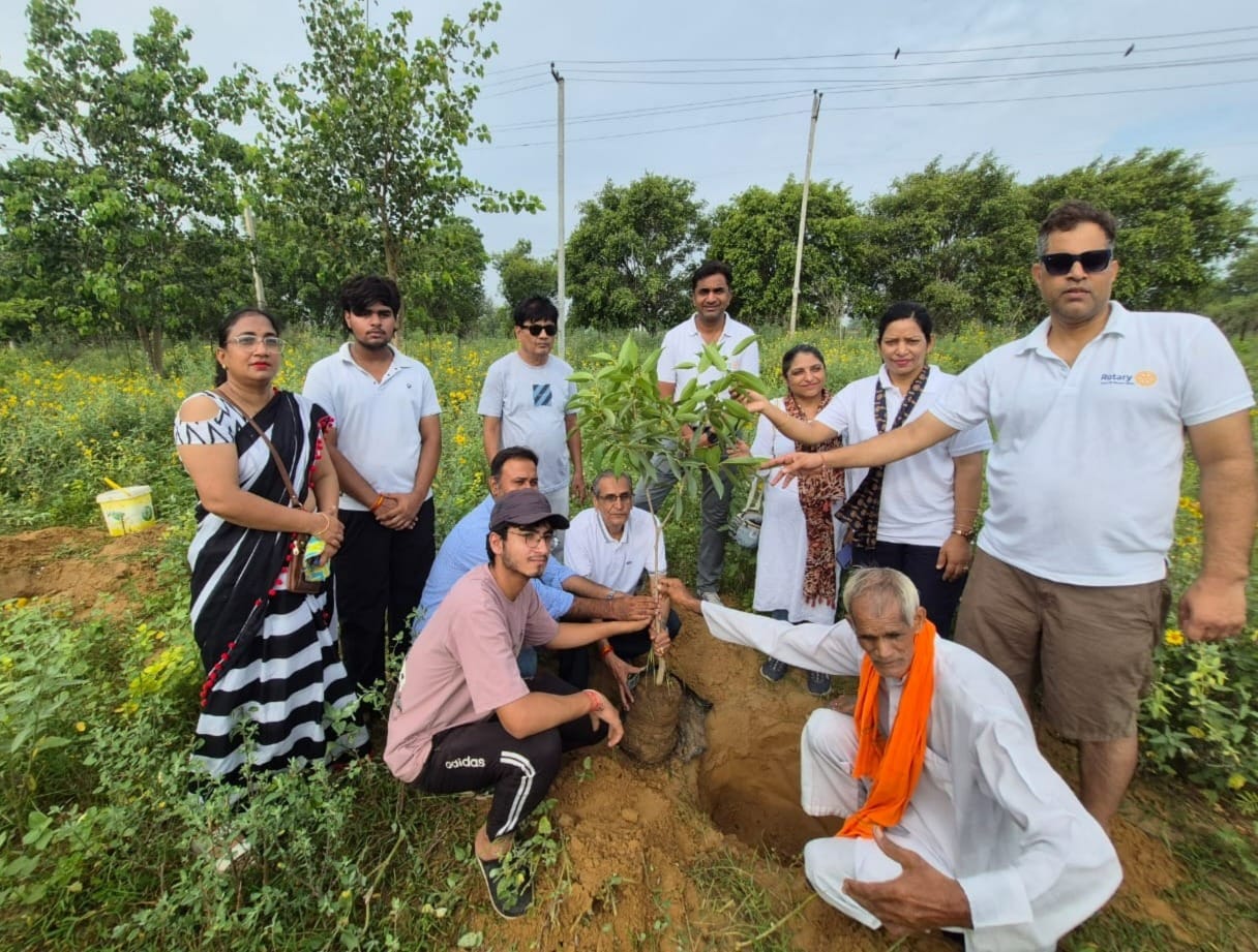 Conveyed a message of environmental conservation by planting saplings.