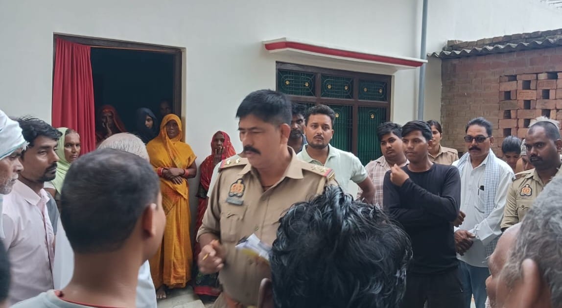 Body of married woman found hanging; murder alleged.