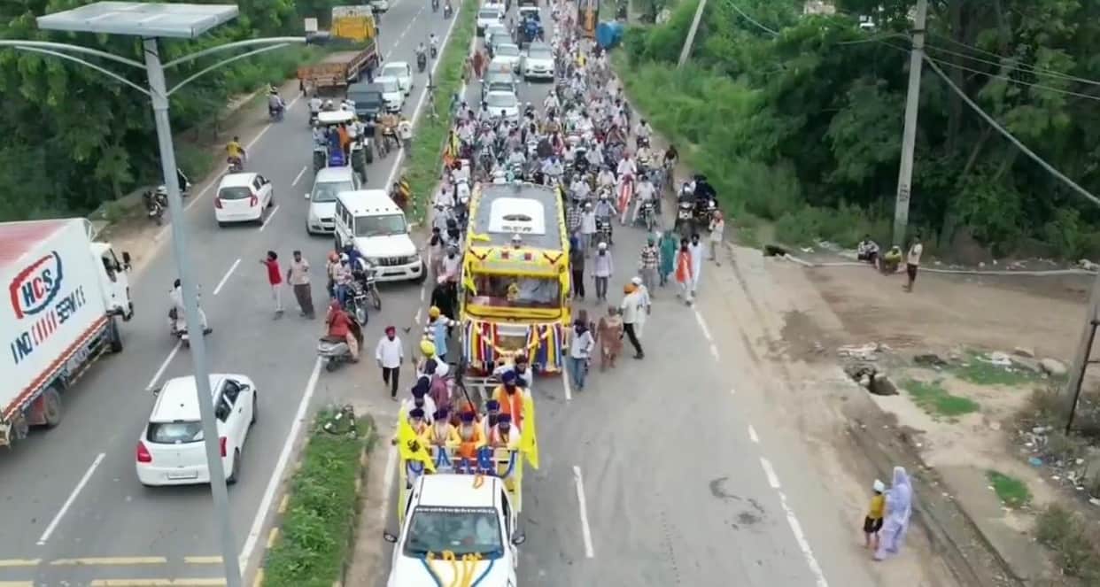 Palanquin decorated with flowers, Nagar Kirtan led by five Pyaras