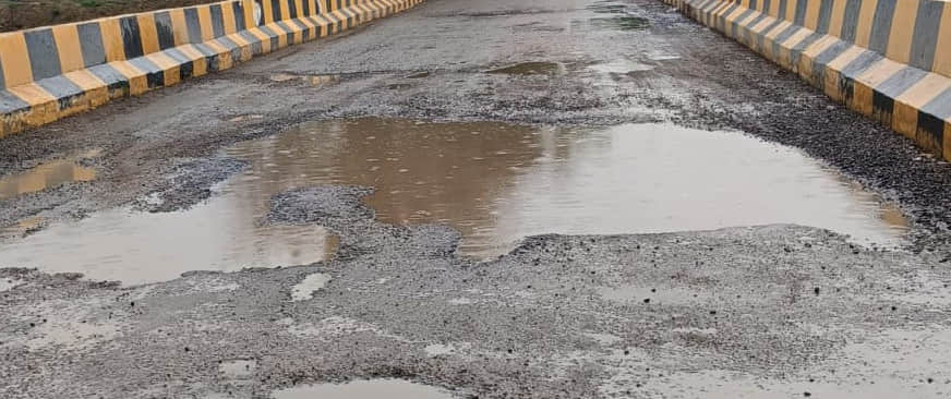Bridge worth 3.75 crore; road surface peels off in first rain; questions raised over construction quality.
