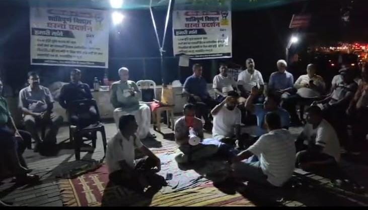 Eco Village-1 residents continue their protest; spirits remain undaunted even in the rain.