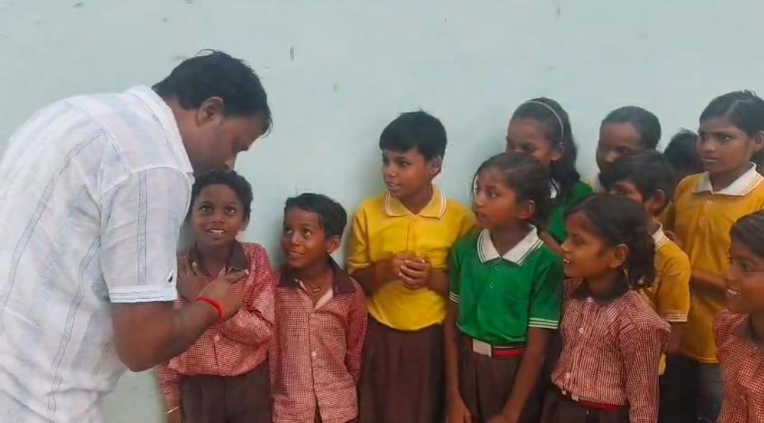 Worms found in mid-day meal; children refused to eat.