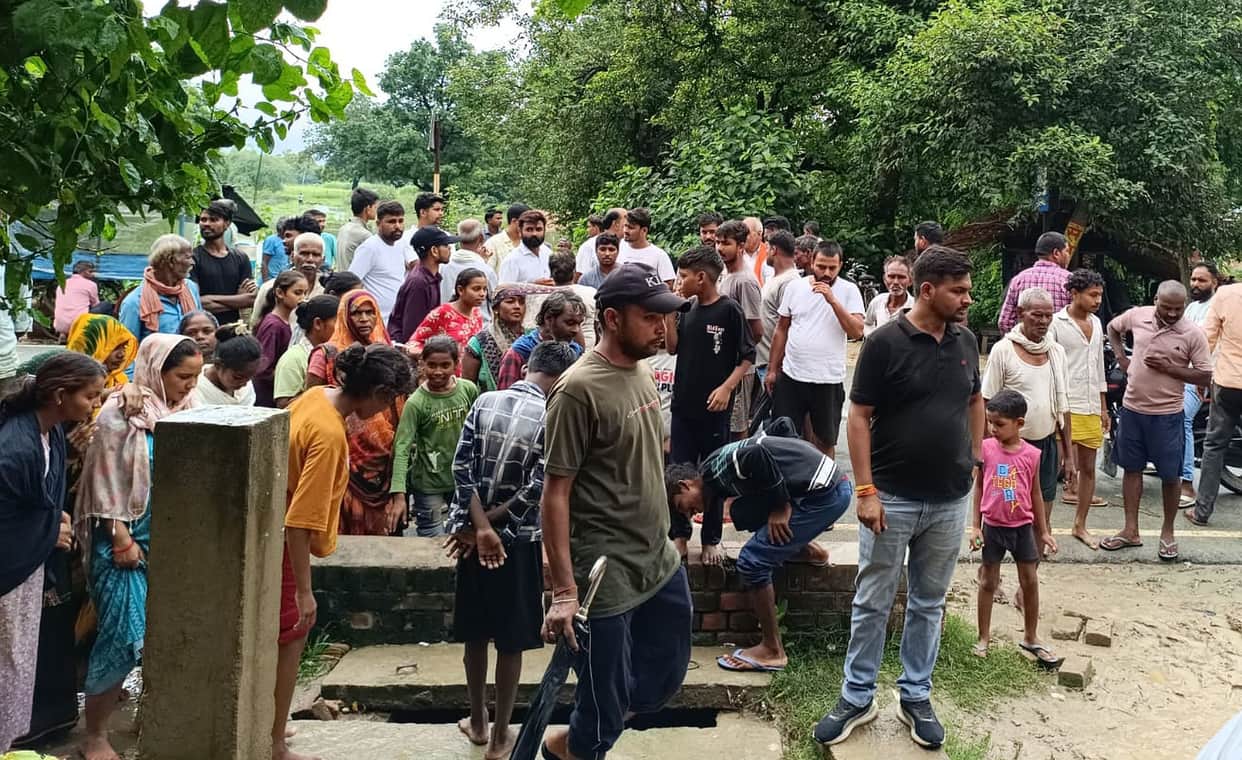 Water entered homes; villagers staged a road blockade.