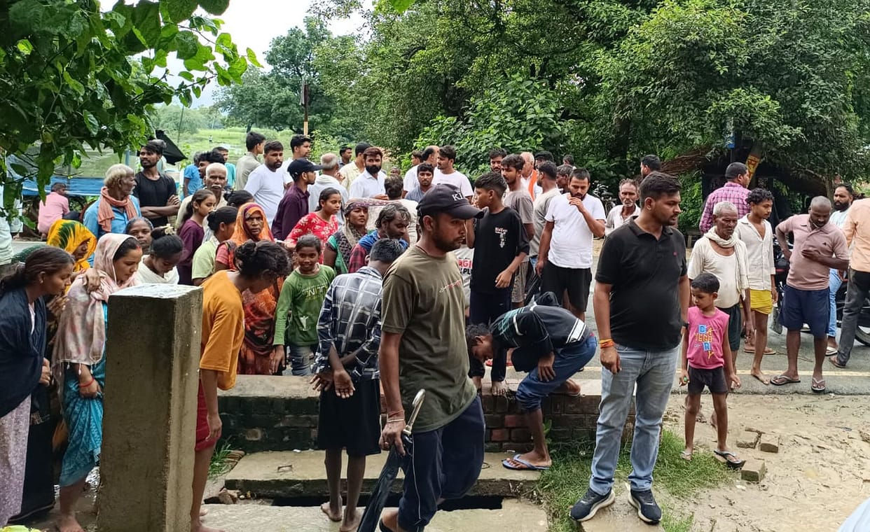 Water entered homes; villagers staged a road blockade.