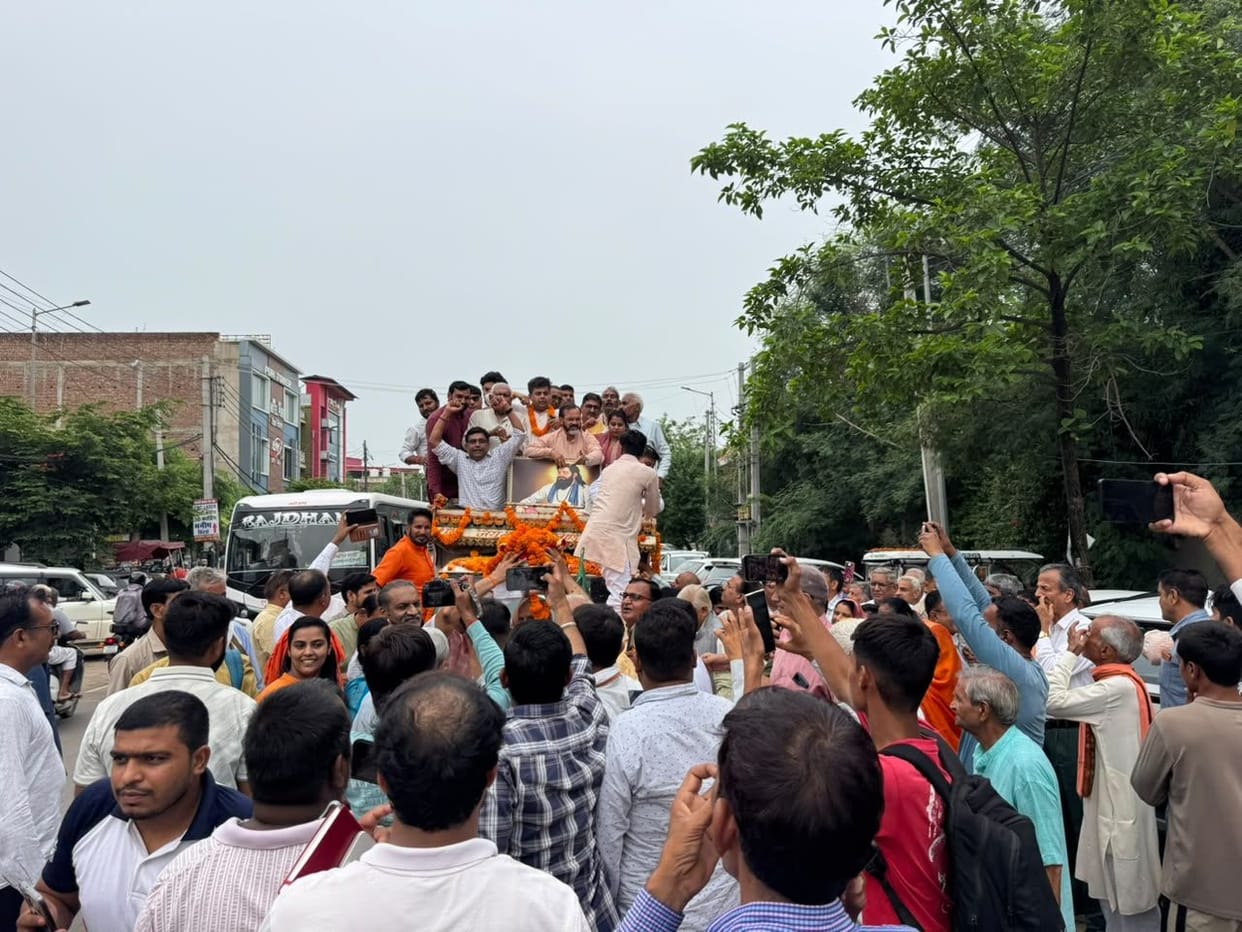 An urn containing sacred soil from the birthplace of Guru Ravidas was welcomed in Narnaul.