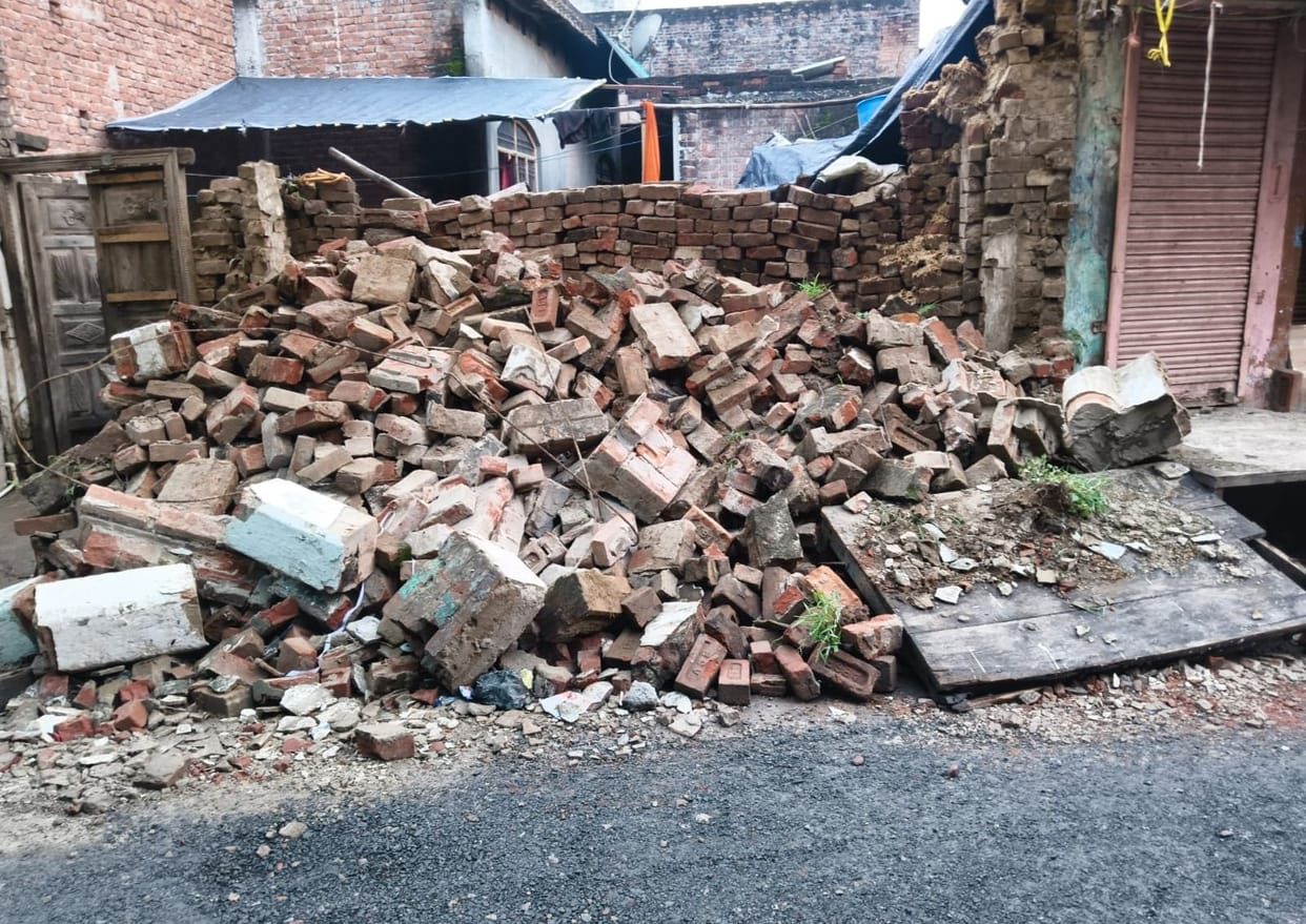 Two closed shops collapsed due to rain.