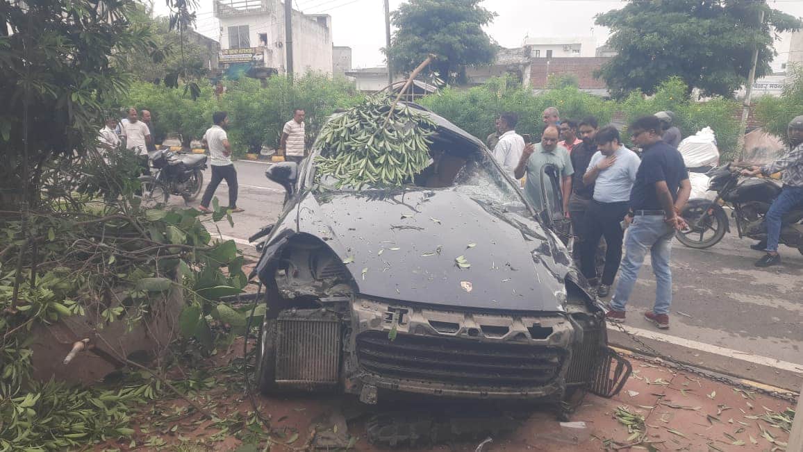 Porsche carrying people returning from a birthday party climbs divider and overturns; four injured