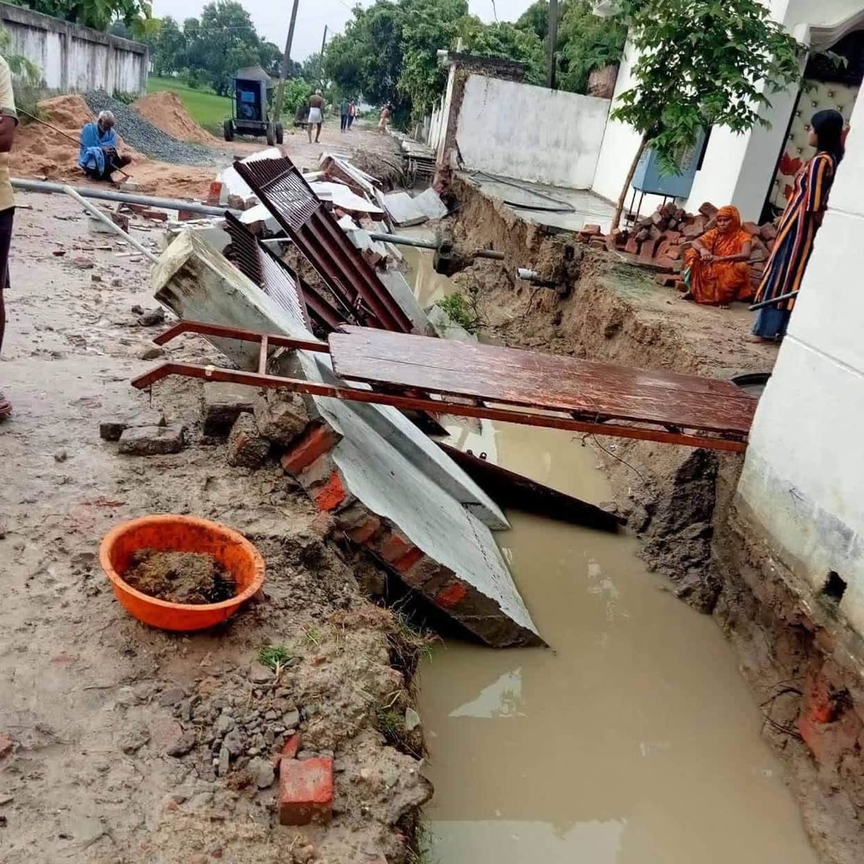House wall collapses in Cabinet Minister's ancestral village due to contractor's negligence.