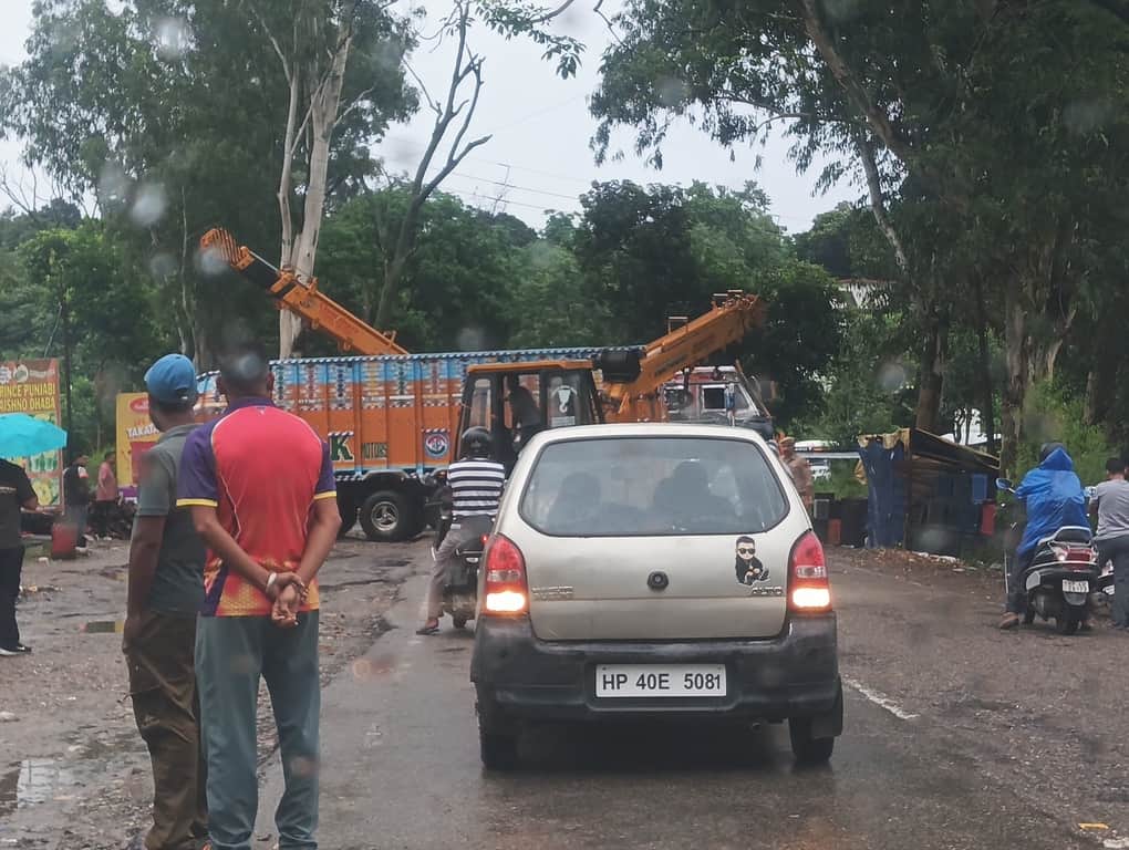 Truck that fell under Kholi Bridge retrieved using a crane.