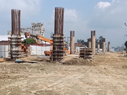Pillars are being erected for the construction of the flyover in Gola