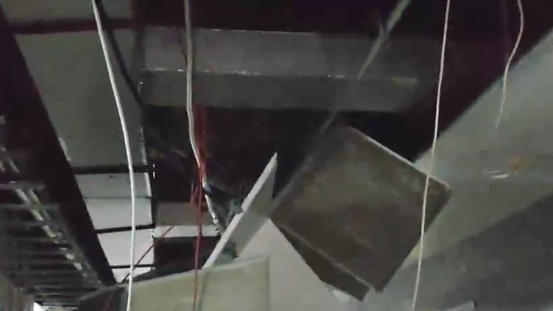 False ceiling collapses at district hospital; patients have a narrow escape.