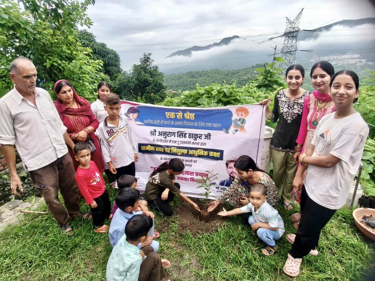 Children planted Jamun, Arjun, and Amla saplings.