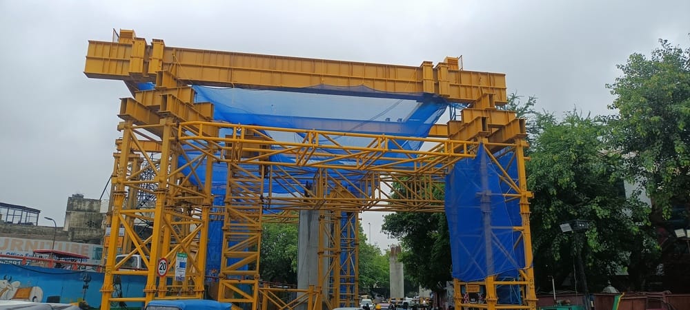 Bridge being built using steel girders at Rawli; Metro to run in December.