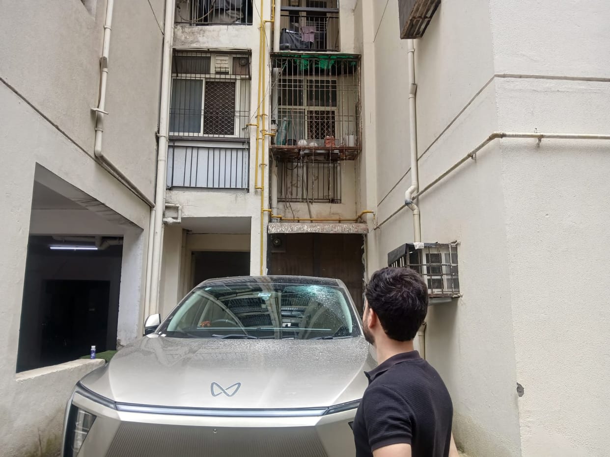 Car window shattered by falling plaster; engineer was visiting a friend's house.