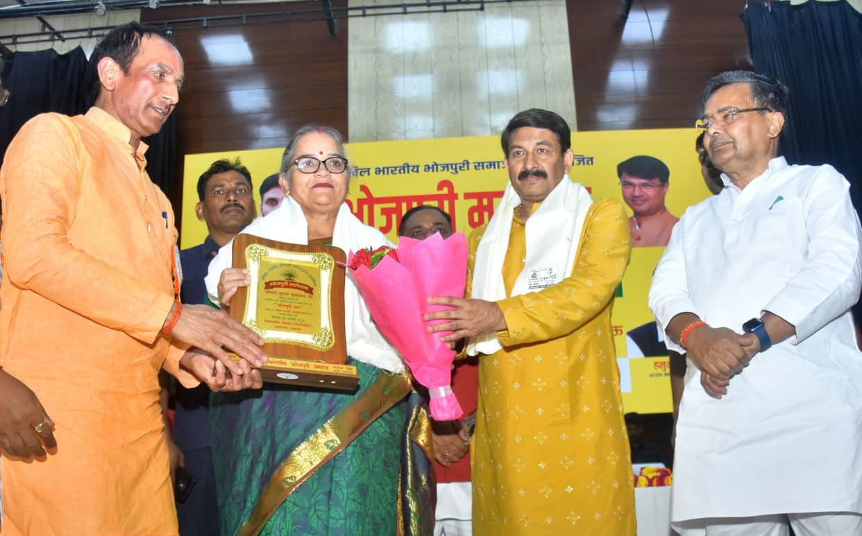 Evening filled with folk songs at the Bhojpuri Festival; distinguished personalities honored.