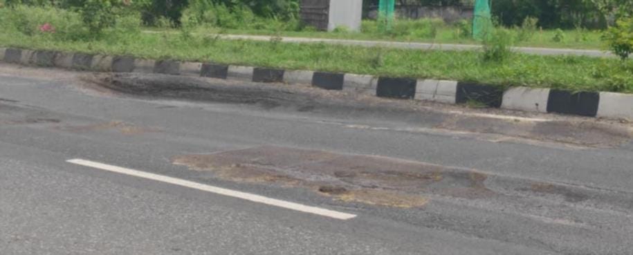 Rain causes National Highway-34 road surface to break apart in several places; commuters face trouble.