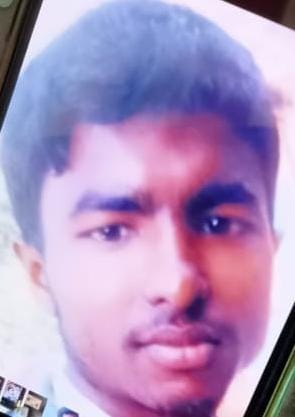 Student sleeping on the floor bitten by a snake; dies.