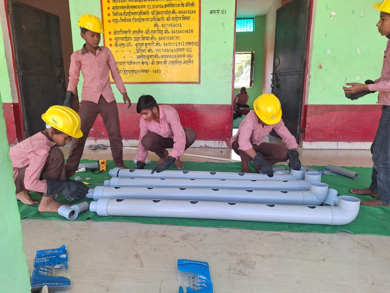 Learning by Doing: Children built a structure to grow plants using hydroponic technology