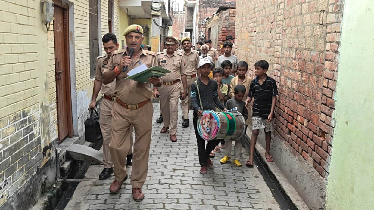 Police made announcement, pasted notice at the house of three accused of Gangster Act