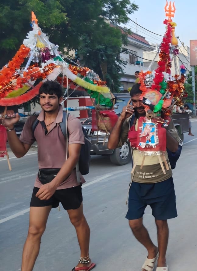 The city became immersed in devotion to Shiva; chants of 'Har Har Mahadev' echoed all around.