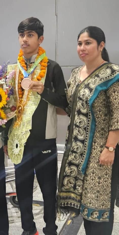 Overcoming physical challenges, Gautam won a Wushu medal in China