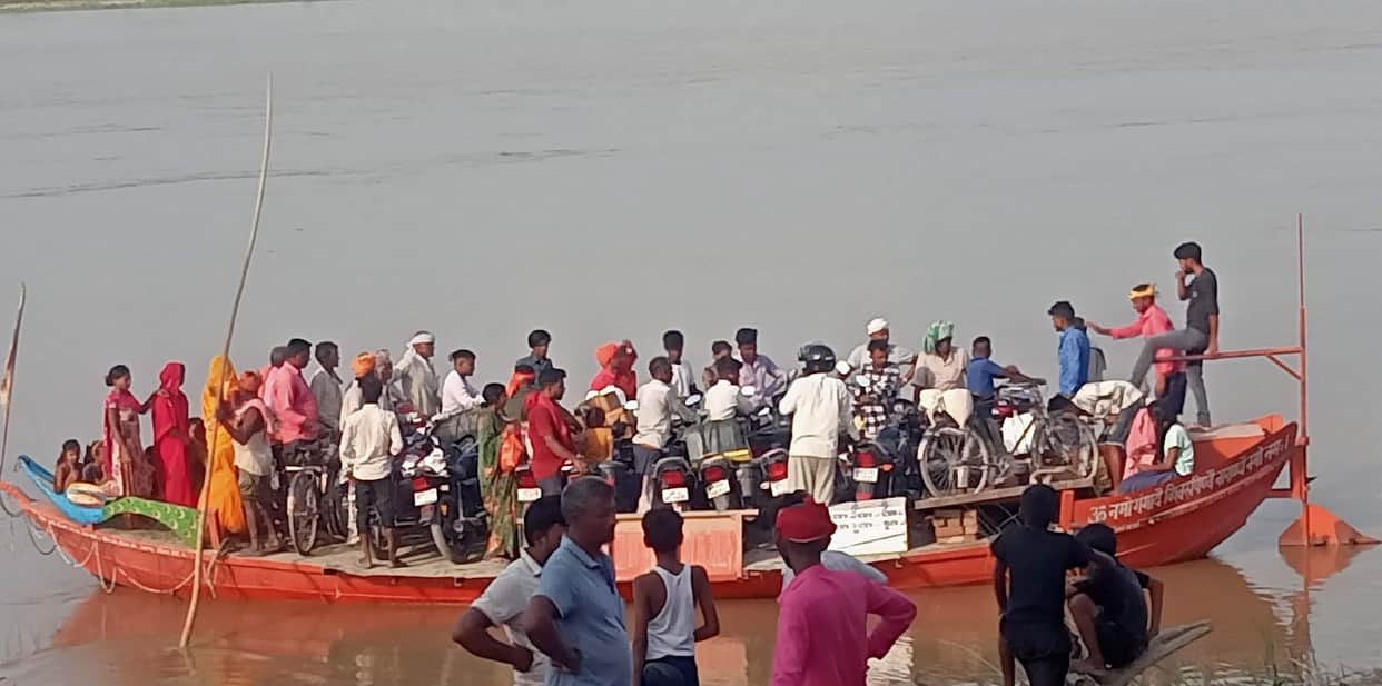 No bridge, only boats to rely on... farmers risk their lives daily for farming.