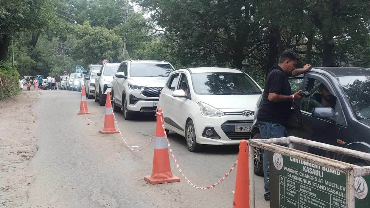 Heavy traffic jams on Kasauli Road over the weekend; commuters inconvenienced by haphazardly parked vehicles.