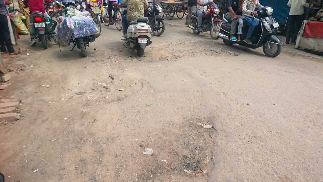 Asphalt will now be laid on the potholed Garhi road