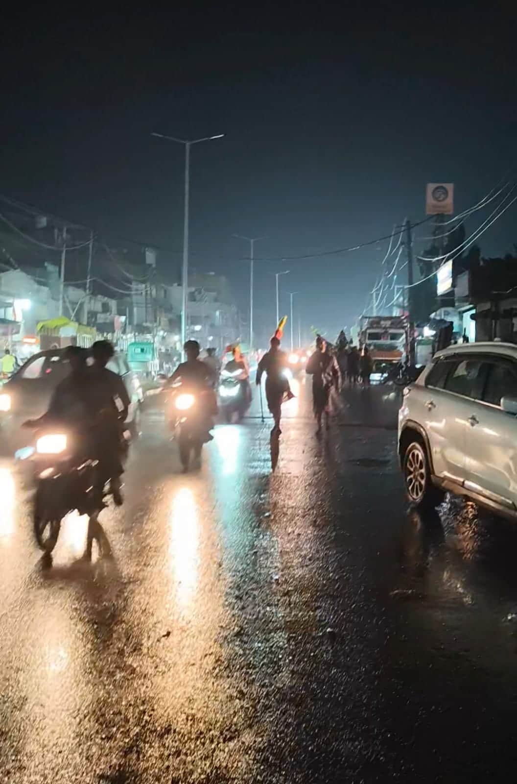The reality of the administration's claims on the ground: streetlights are off, and Kanwariyas are getting injured in potholes.
