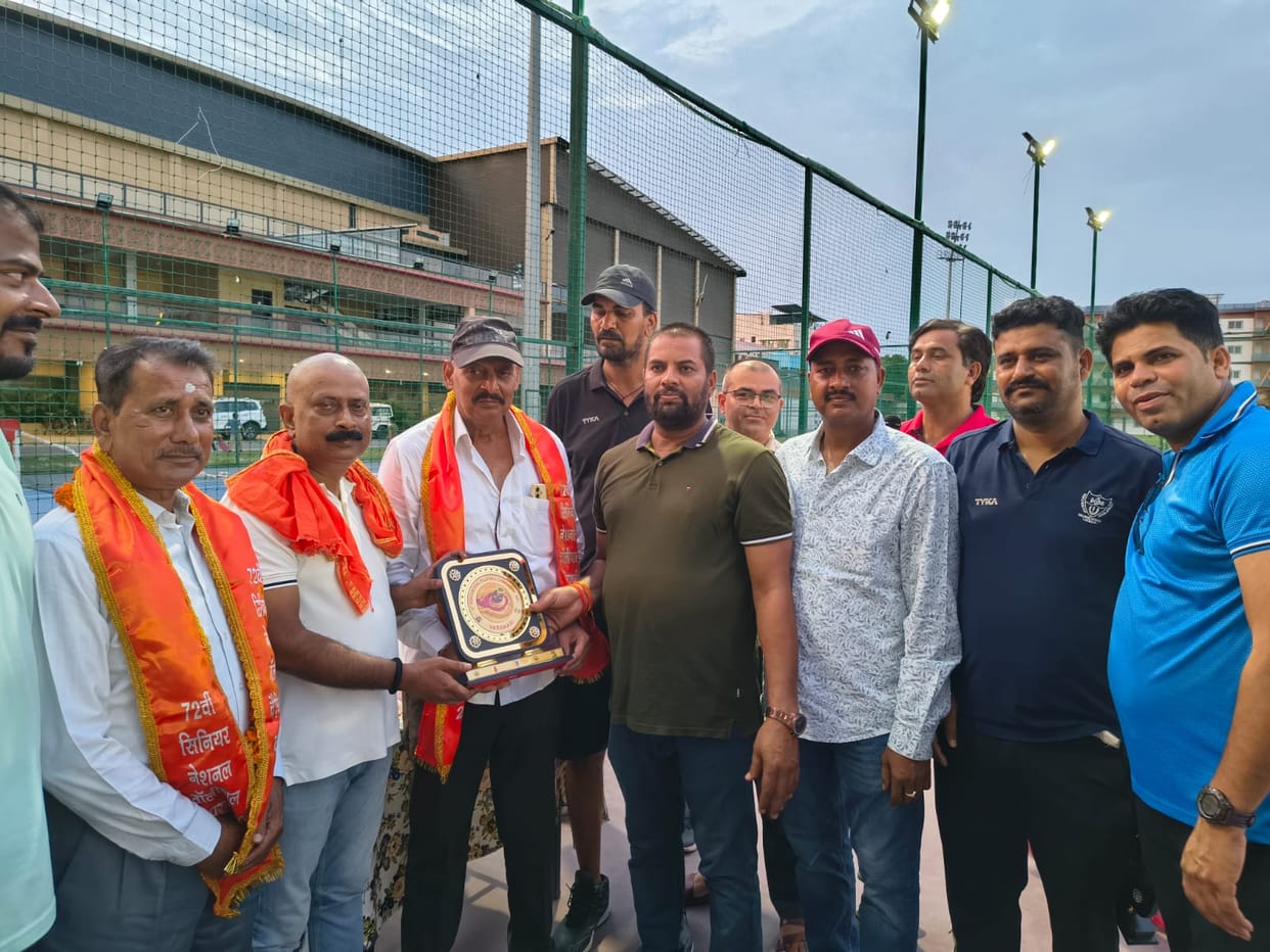 Vidyapeeth's volleyball coach felicitated at Sigra Stadium.